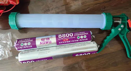 Silicone sealant and sealant gun