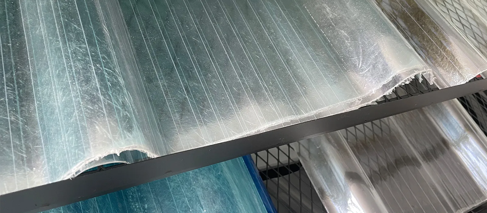 Translucent fiberglass roof panels save electricity and provide daylight